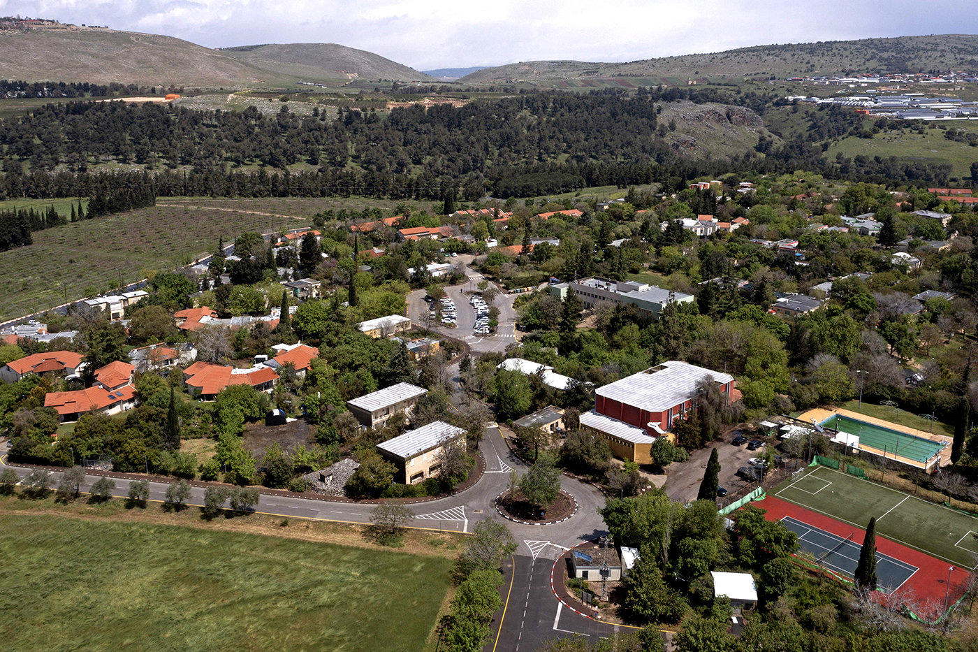 An aerial view taken on April 13, 2023 shows the northern Israeli kibbutz of Yiron which was established in 1949 less than two kilometres from the Lebanese border, on the ruins of a Palestinian village destroyed by Jewish forces during the 1948-1949 Arab-Israeli war. Entrepreneurs are repurposing the Israeli kibbutz into hubs for creative and hi-tech industries, after decades of decline in the rural communities once considered models of socialism. (Photo by MENAHEM KAHANA / AFP) (Photo by MENAHEM KAHANA/AFP via Getty Images)